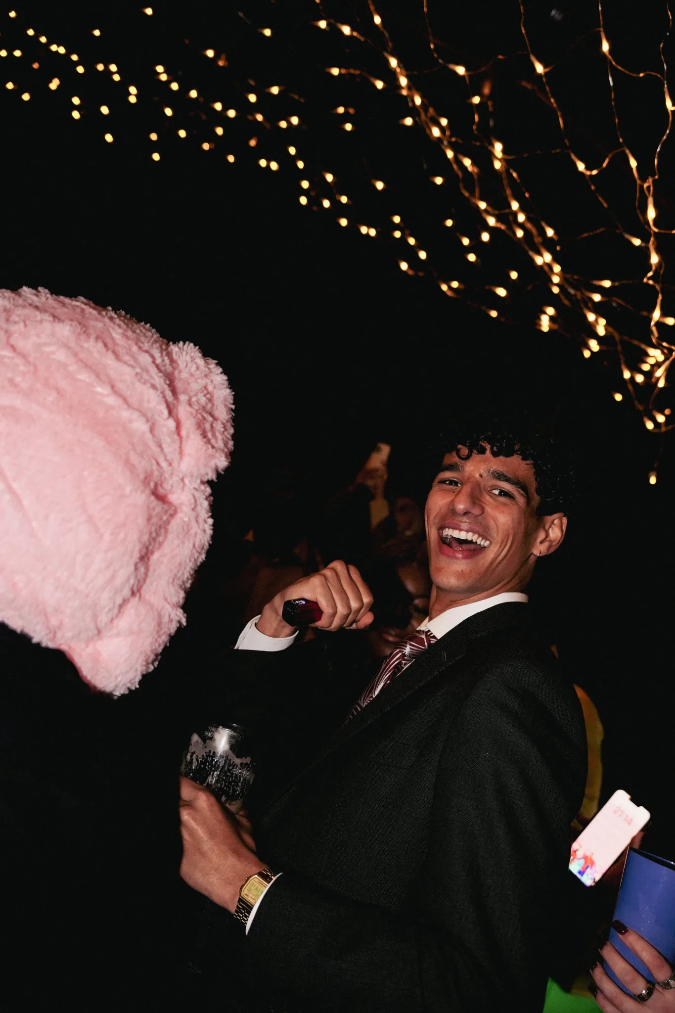 Guest enjoying the party under the marquee lights